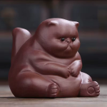 Gatto tea pet in argilla viola