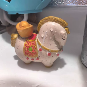 Tea pet a forma di cavallo che cambia colore