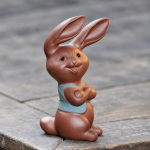Tea pet a forma di coniglio in argilla viola