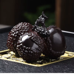 Tea pet a forma di grappolo di litchi che cambia colore