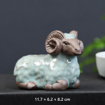 Tea pet a forma di pecora in ceramica — Sdraiata, testa tortora con corna