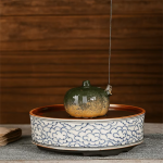 Tea pet a forma di zucca con rana in sabbia viola