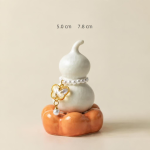 Tea pet a forma di zucca con smalto cristallino — Bianco crema, base arancione