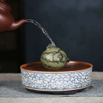 Tea pet a getto d’acqua in argilla viola