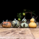 Tea pet a getto d’acqua in argilla viola — Set da 4