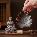 Tea pet Buddha con filtro per tè in argilla viola