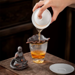 Tea pet Buddha con filtro per tè in argilla viola