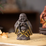 Tea pet Buddha ridente con rosario nero