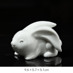 Tea pet coniglio in ceramica con orecchie pendenti — Sdraiato lucido