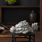 Tea pet in arenaria blu con rilievi scolpiti