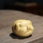 Tea pet maialino in ceramica a forma di testa — Giallo crema