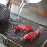 Tea pet pesci in resina con cambio di colore