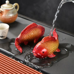 Tea pet pesci in resina con cambio di colore