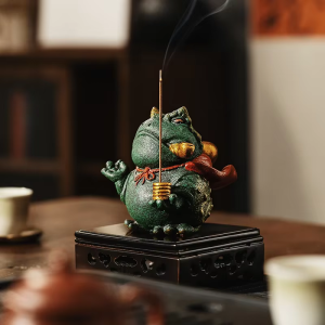 Tea pet rana in argilla viola