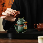 Tea pet rana in argilla viola