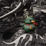 Tea pet rana in argilla viola
