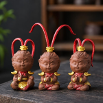 Tea pet Re Scimmia in argilla viola