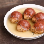 Tea pet tartaruga in argilla viola