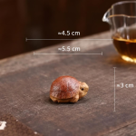 Tea pet tartaruga in argilla viola