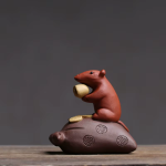 Tea pet topo con base a forma di borsetta