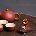 Tea pet topo con base a forma di borsetta