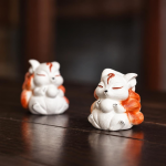 Tea pet volpe a nove code scolpito a mano