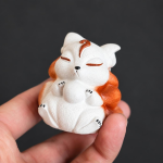 Tea pet volpe a nove code scolpito a mano
