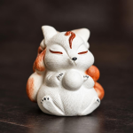 Tea pet volpe a nove code scolpito a mano