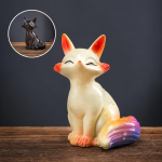 Tea pet volpe termocromico in ceramica — Una statuetta seduta